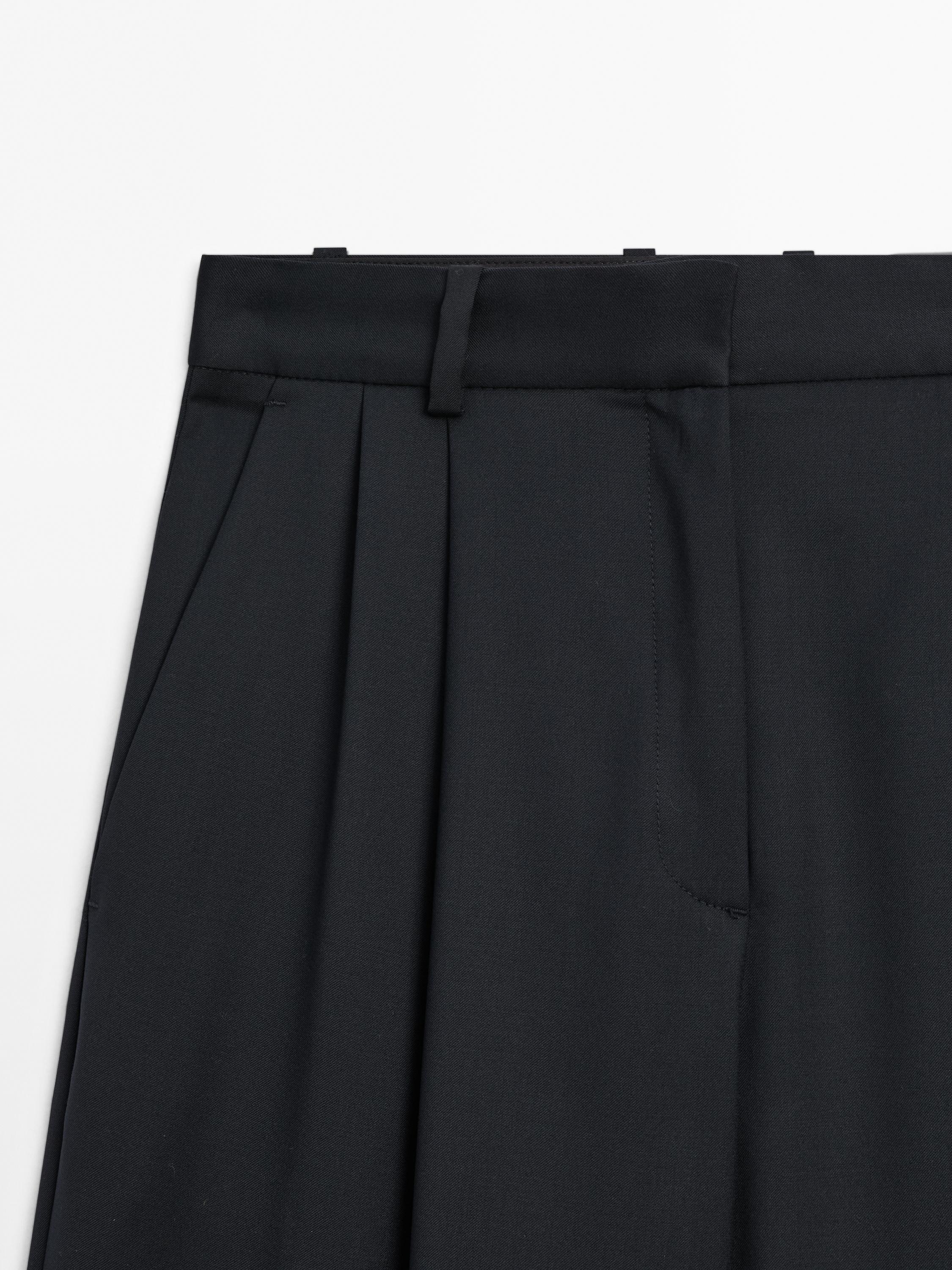Pleated extra fine wool trousers